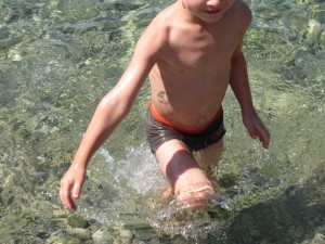 M in water