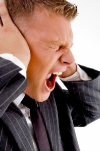 man holding head